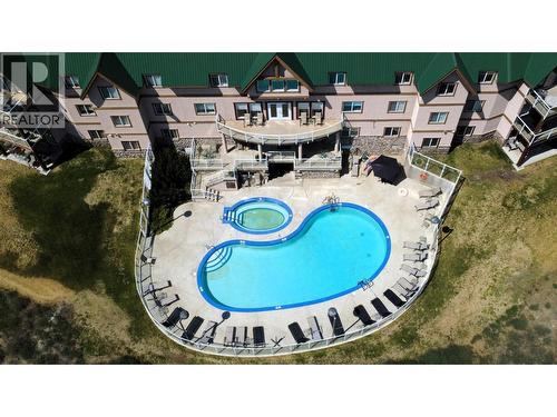 701 14A Crescent Unit# 213 I, Invermere, BC - Outdoor With In Ground Pool