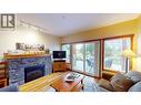 701 14A Crescent Unit# 213 I, Invermere, BC  - Indoor Photo Showing Living Room With Fireplace 