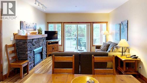 701 14A Crescent Unit# 213 I, Invermere, BC - Indoor Photo Showing Living Room With Fireplace