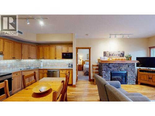 701 14A Crescent Unit# 213 I, Invermere, BC - Indoor With Fireplace