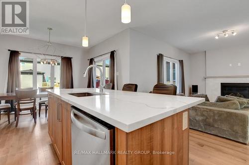 609 Misty Street, Russell, ON - Indoor Photo Showing Kitchen With Fireplace