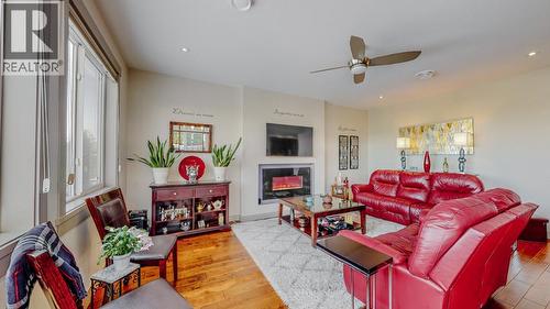 12300 Pinehurst Place Unit# 16, Osoyoos, BC - Indoor Photo Showing Living Room With Fireplace