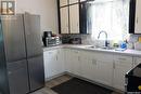318 4Th Avenue W, Assiniboia, SK  - Indoor Photo Showing Kitchen With Double Sink 