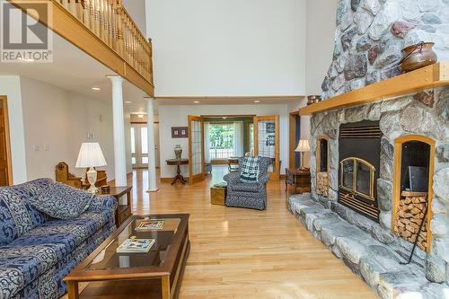 21 Lighthouse Point Dr, Thessalon, ON - Indoor Photo Showing Living Room With Fireplace
