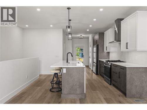 Kitchen. Photos taken from similar home in the community. - 2835 Canyon Crest Drive Unit# 7, West Kelowna, BC - Indoor Photo Showing Kitchen With Upgraded Kitchen