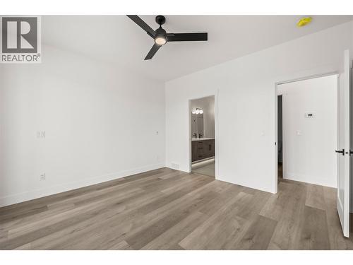 Primary bedroom. Photos taken from similar home in the community. - 2835 Canyon Crest Drive Unit# 7, West Kelowna, BC - Indoor Photo Showing Other Room