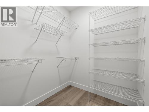 Primary walk-in closet. Photos taken from similar home in the community. - 2835 Canyon Crest Drive Unit# 7, West Kelowna, BC - Indoor With Storage