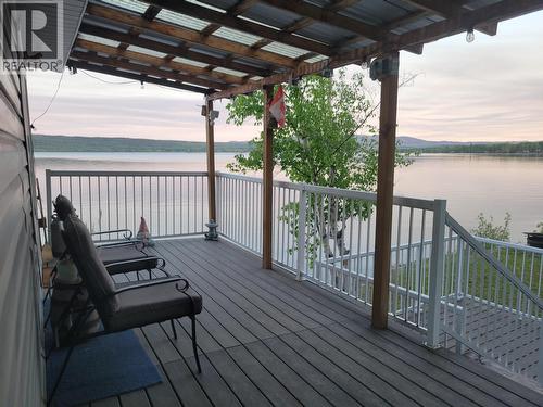 8687 Gala Bay Road, Fraser Lake, BC - Outdoor With Body Of Water With Deck Patio Veranda With Exterior