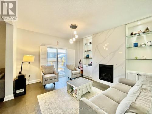 Upper Unit - 33 Olympic Gate, Barrie, ON - Indoor Photo Showing Living Room With Fireplace