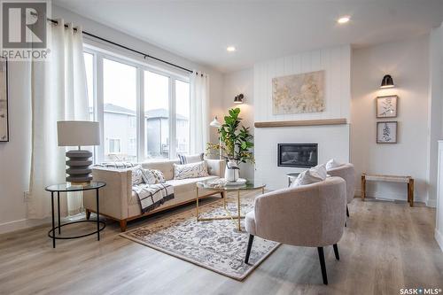 14 Sunterra Drive, Shields, SK - Indoor Photo Showing Living Room With Fireplace