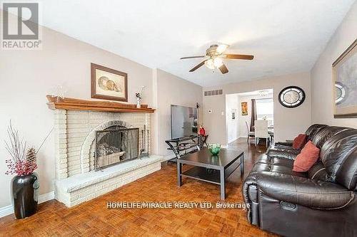 73 - 7080 Copenhagen Road, Mississauga, ON - Indoor Photo Showing Living Room With Fireplace