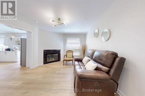 69 Wooliston Crescent, Brampton, ON - Indoor Photo Showing Living Room With Fireplace