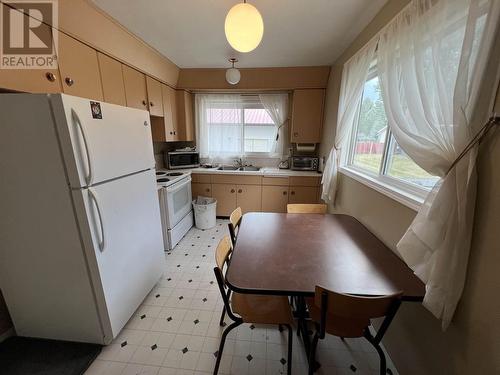 5527 48 Street, Fort Nelson, BC - Indoor Photo Showing Kitchen With Double Sink
