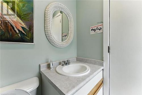 Half bathroom with vanity and toilet - 207 Greenwich Street, Brantford, ON 