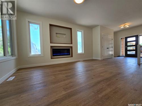 44 Kenney Crescent, Weyburn, SK - Indoor Photo Showing Living Room With Fireplace