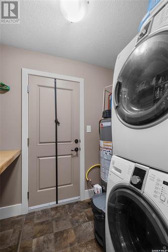 205 Aspen Cove, Paddockwood Rm No. 520, SK - Indoor Photo Showing Laundry Room