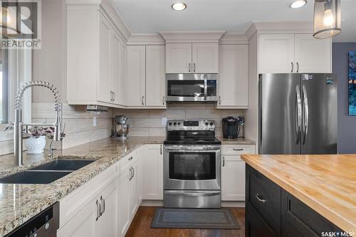 205 Aspen Cove, Paddockwood Rm No. 520, SK - Indoor Photo Showing Kitchen With Double Sink With Upgraded Kitchen