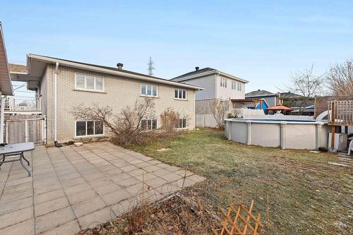 Cour - 5886 Rue Alain, Brossard, QC - Outdoor With Above Ground Pool With Exterior