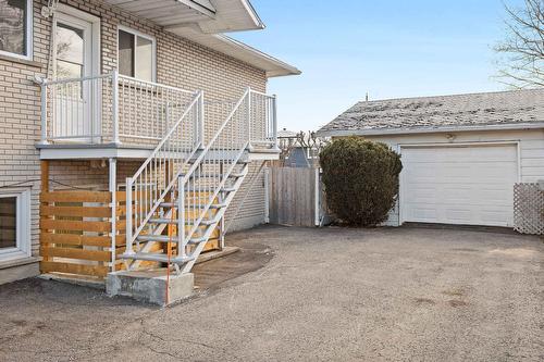 Garage - 5886 Rue Alain, Brossard, QC - Outdoor With Exterior
