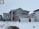 720 Weir Crescent, Warman, SK  - Outdoor With Facade 