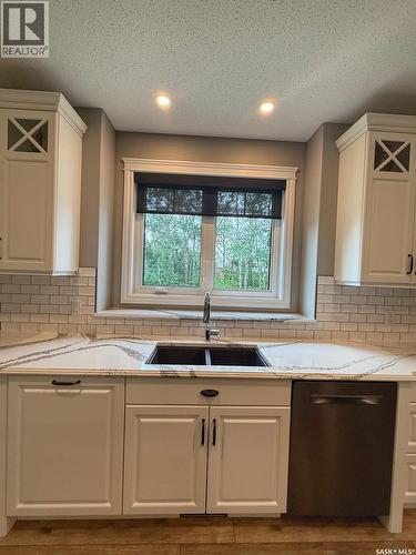 214 Hillside Drive, Tobin Lake, SK - Indoor Photo Showing Kitchen With Double Sink