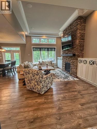 214 Hillside Drive, Tobin Lake, SK - Indoor Photo Showing Living Room With Fireplace