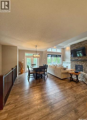 214 Hillside Drive, Tobin Lake, SK - Indoor Photo Showing Living Room With Fireplace