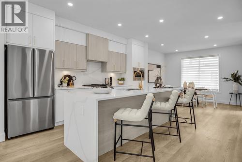 Photos are of a similar home in the community. - 5300 Main Street Unit# 115, Kelowna, BC - Indoor Photo Showing Kitchen With Upgraded Kitchen