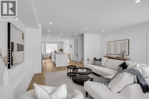 Photos are of a similar home in the community. - 5300 Main Street Unit# 115, Kelowna, BC - Indoor Photo Showing Living Room