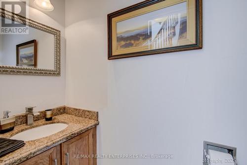 Main level powder room - 4425 Sawmill Valley Drive, Mississauga, ON - Indoor Photo Showing Bathroom