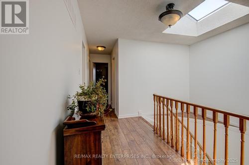 Super bright hallways with skylight - 4425 Sawmill Valley Drive, Mississauga, ON - Indoor Photo Showing Other Room