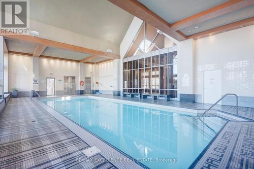 Gv202 - 320 City  Centre Drive, Mississauga, ON - Indoor Photo Showing Other Room With In Ground Pool