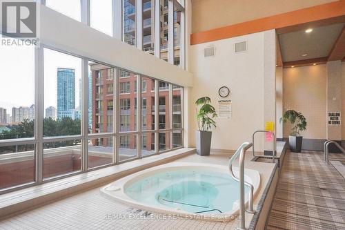 Gv202 - 320 City  Centre Drive, Mississauga, ON - Indoor Photo Showing Other Room With In Ground Pool
