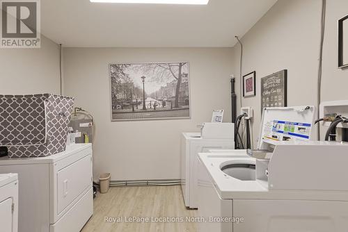 Building shared coin laundry room - Unit 18 - 209472 26 Highway, Blue Mountains, ON - Indoor Photo Showing Laundry Room
