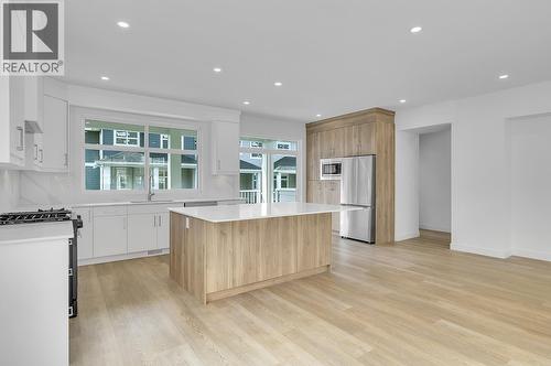 Photos may be of a similar home in the community - 5300 Main Street Unit# 124, Kelowna, BC - Indoor Photo Showing Kitchen