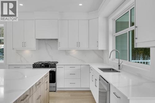 Photos may be of a similar home in the community - 5300 Main Street Unit# 124, Kelowna, BC - Indoor Photo Showing Kitchen With Double Sink With Upgraded Kitchen
