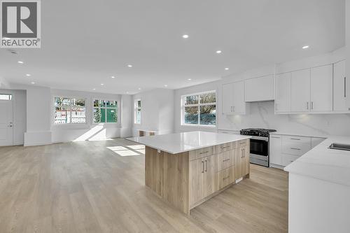 Photos may be of a similar home in the community - 5300 Main Street Unit# 124, Kelowna, BC - Indoor Photo Showing Kitchen With Upgraded Kitchen