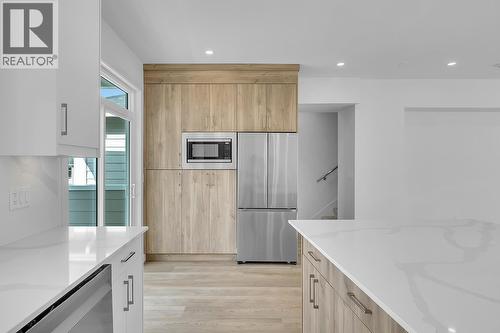 Photos may be of a similar home in the community - 5300 Main Street Unit# 124, Kelowna, BC - Indoor Photo Showing Kitchen