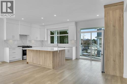 Photos may be of a similar home in the community - 5300 Main Street Unit# 124, Kelowna, BC - Indoor Photo Showing Kitchen With Upgraded Kitchen
