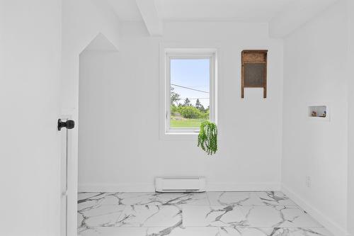 Salle de lavage - 6 Ch. Des Plaines, Cap-Saint-Ignace, QC - Indoor Photo Showing Other Room