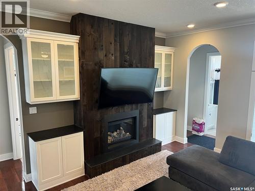 Natalie Acres, Waldeck, SK - Indoor Photo Showing Living Room With Fireplace