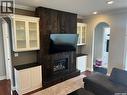 Natalie Acres, Waldeck, SK  - Indoor Photo Showing Living Room With Fireplace 