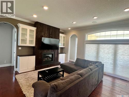 Natalie Acres, Waldeck, SK - Indoor Photo Showing Living Room With Fireplace