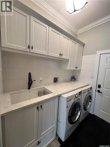 Natalie Acres, Waldeck, SK - Indoor Photo Showing Laundry Room