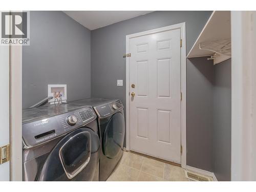 5526 Lakeside Court, 103 Mile House, BC - Indoor Photo Showing Laundry Room