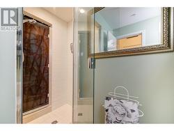 Glass door leading to shower stall - 