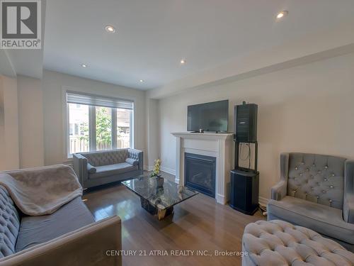 6 Wildflower Way, Toronto, ON - Indoor Photo Showing Living Room With Fireplace