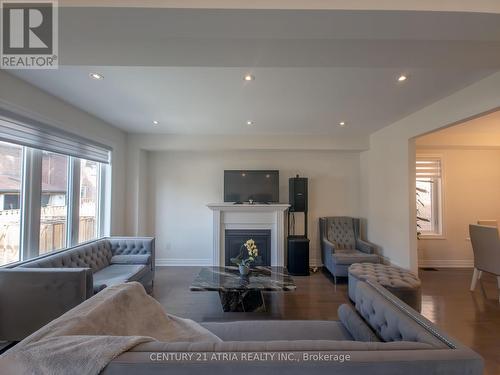 6 Wildflower Way, Toronto, ON - Indoor Photo Showing Living Room With Fireplace