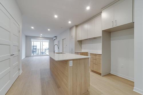 Kitchen - 104-3420 Boul. René-Laennec, Laval (Vimont), QC - Indoor