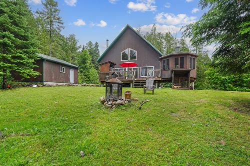 Face arrière - 1820 Rue Du Cerf, Chertsey, QC - Outdoor With Deck Patio Veranda